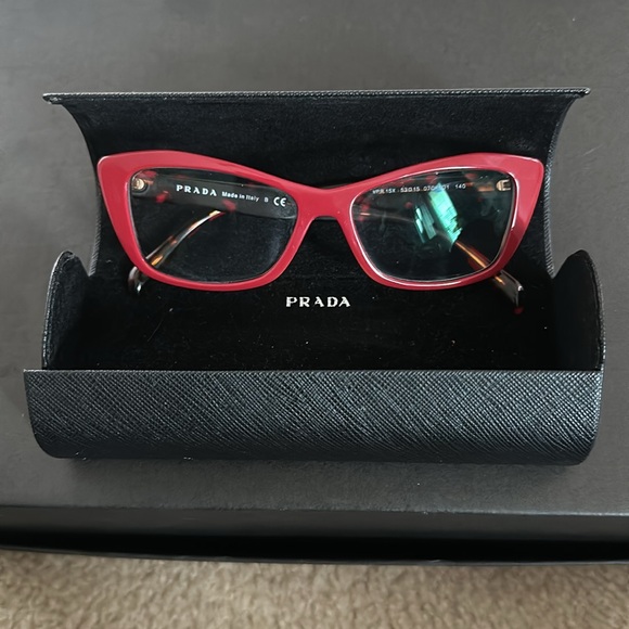 Prada frames with case. They do have a prescription in them. - Picture 2 of 3